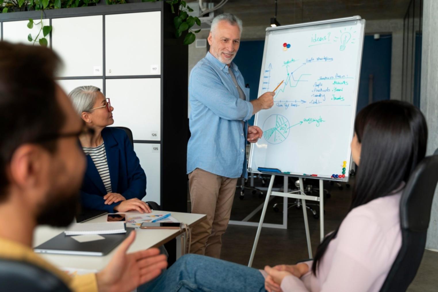 Oficina moderna con equipos trabajando en análisis financiero